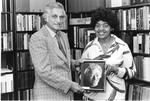 Woods Hall - Artist Gladys Beard Presents a Photo of Her Sculpture of Howard B. Woods to Chancellor Arnold Grobman 1377 by University of Missouri-St. Louis and Daniel Magidson