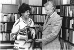 Woods Hall - Artist Gladys Beard Presents a Photo of Her Sculpture of Howard B. Woods to Chancellor Arnold Grobman 1378 by University of Missouri-St. Louis and Daniel Magidson